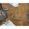 Laminat 'Ville Carrito' Fischgrät Eiche goldfarben 8 mm
